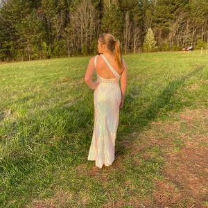 Stunning white with iridescent purple, pink, aqua sequins long prom dress.